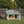 Spacious Wooden Dog House with Porch - Sturdy, Weather - Resistant for Medium Dogs - Small Pet Homes