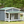 Spacious Wooden Dog House with Porch - Sturdy, Weather - Resistant for Medium Dogs - Small Pet Homes