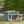 Spacious Wooden Dog House with Porch - Sturdy, Weather - Resistant for Medium Dogs - Small Pet Homes